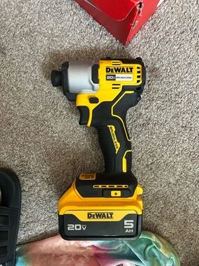 DEWALT 20V Brushless Cordless Impact Driver - Yellow & Black and charger.